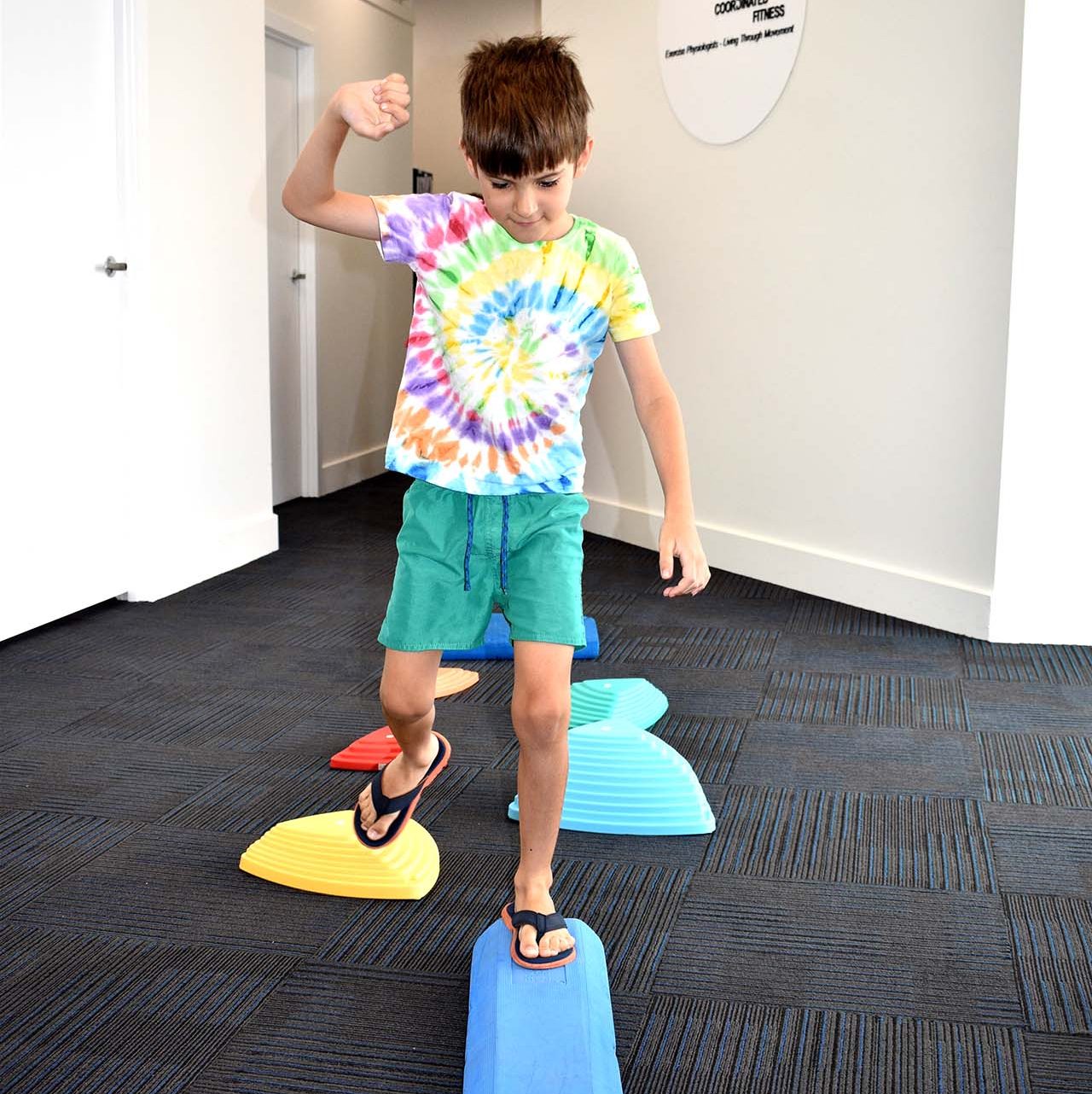 kid walking across beam